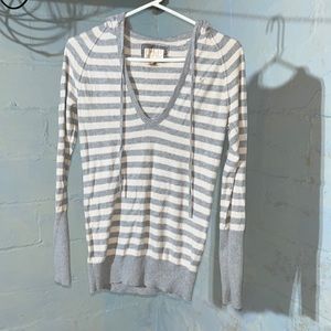 Gray and cream striped American Eagle sweater.